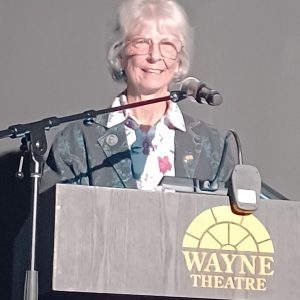 Chris Bolgiano speaking at the Wayne Theatre on April 21, 2026